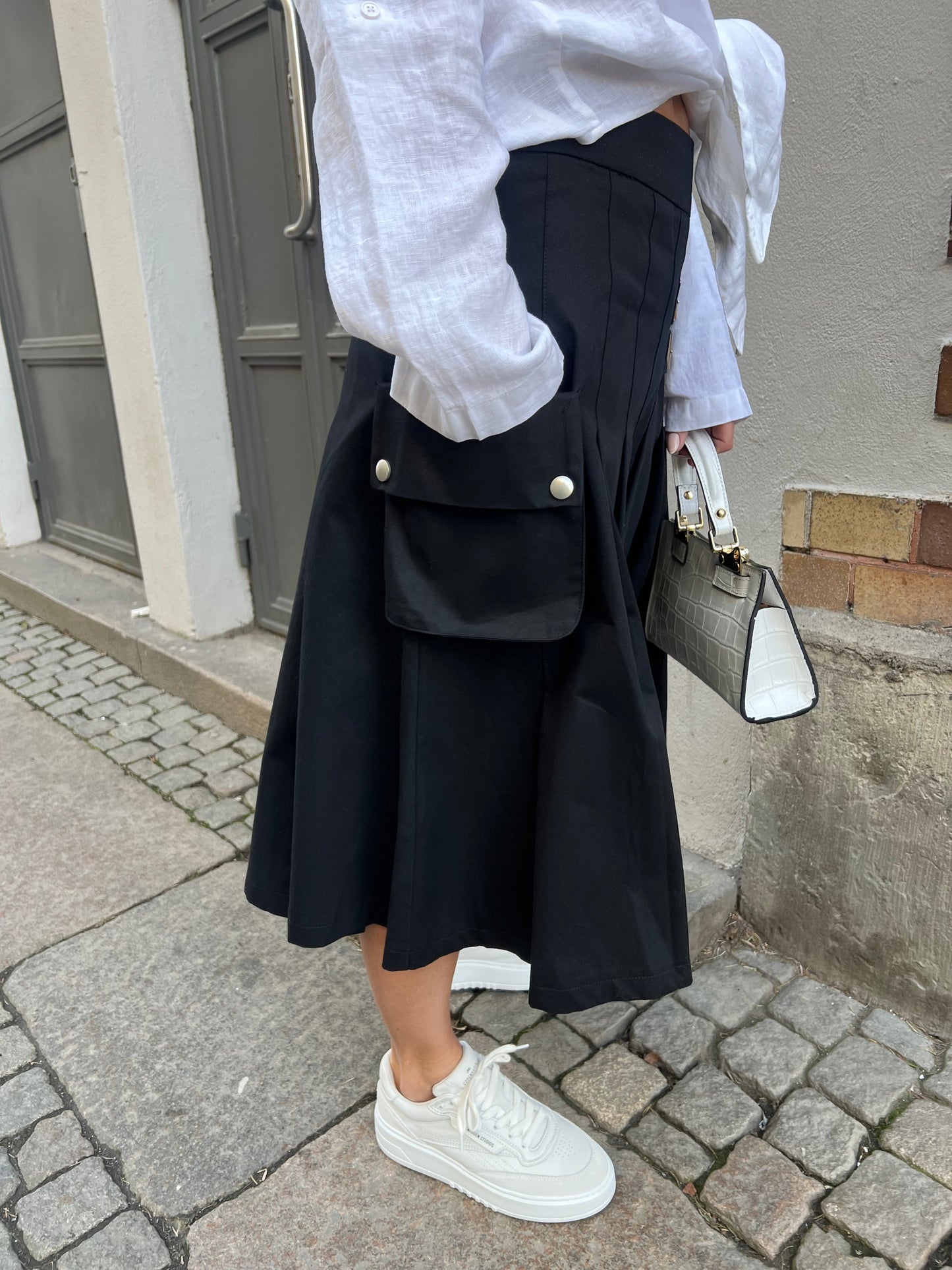 ANNA SKIRT PLISSE svart - YE1SK211
